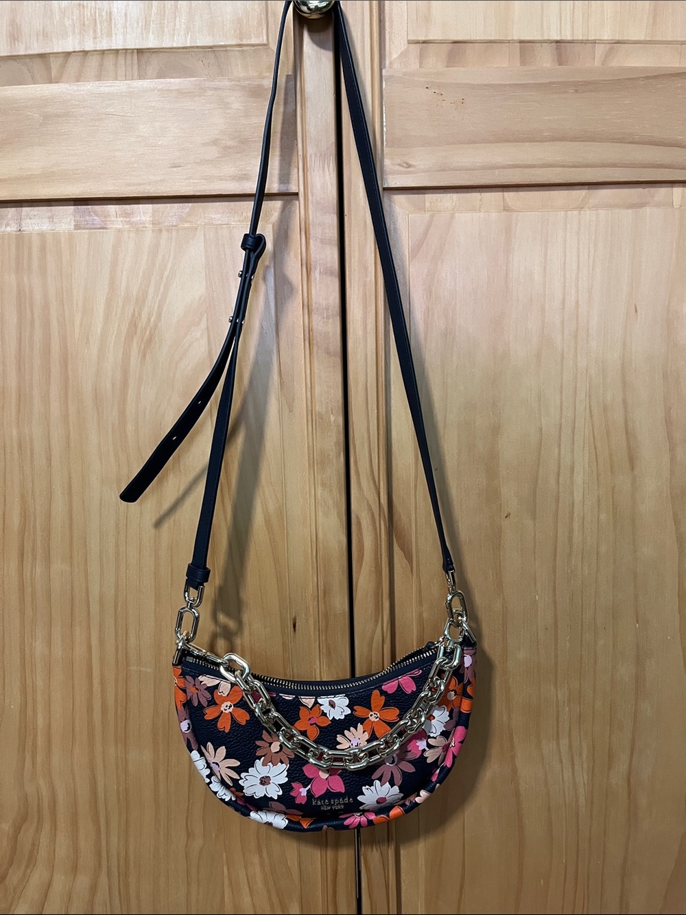 kate spade floral mini crescent crossbody in navy with pink, orange and white